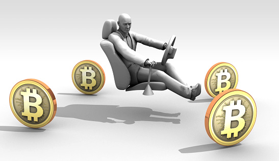 The investor, traveling on wheels of Bitcoins, first stops and then suddenly accelerates, depending on market conditions. / You can see the animation movie of this image from my iStock video portfolio. Video number: 1925430408