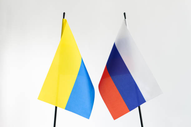 istock Ukrainian and Russian Flags 1926718301