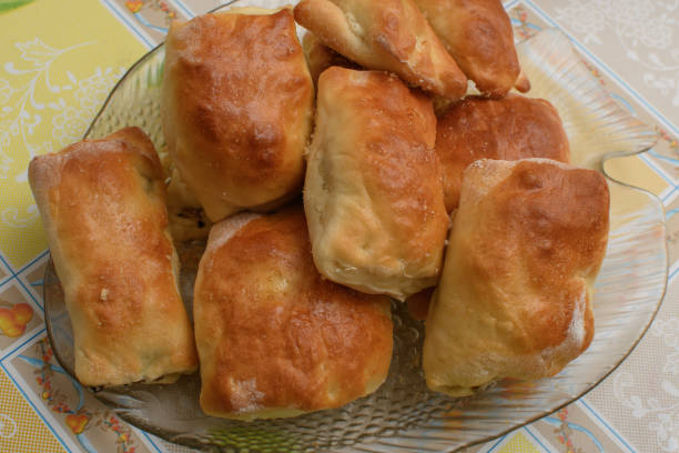 istock Yeast rolls, baked patties stuffed with cabbage and mushrooms 1926750052