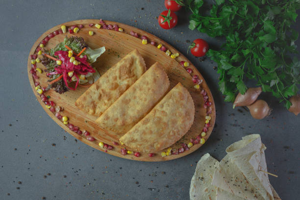 istock Turkish style raw pastry plate prepared to be served with salad 1926812825