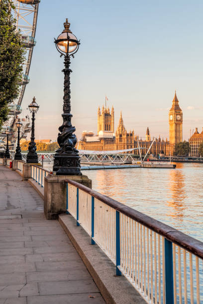 istock Waterfront against Big Ben with Thames river in London, England, UK 1926816448