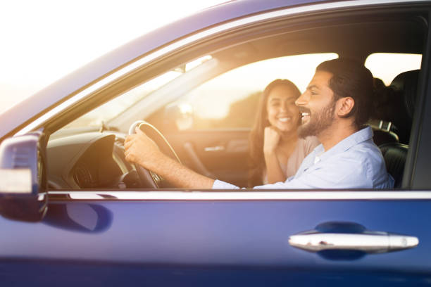 istock Joyful middle eastern couple in car ready for a road trip 1926873092