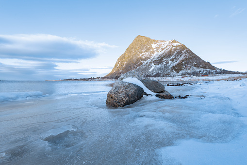 Hoven mountain at Gimsøya island in the Lofoten during winter in Northern Norway.
