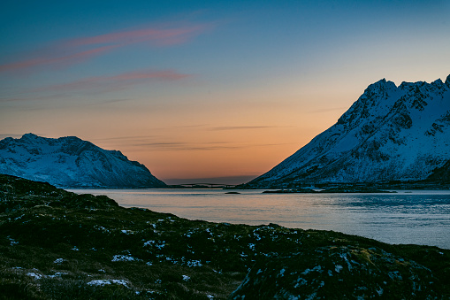 View down Sydalspollen Fjord during sunset in the Lofoten in Northern Norway in winter