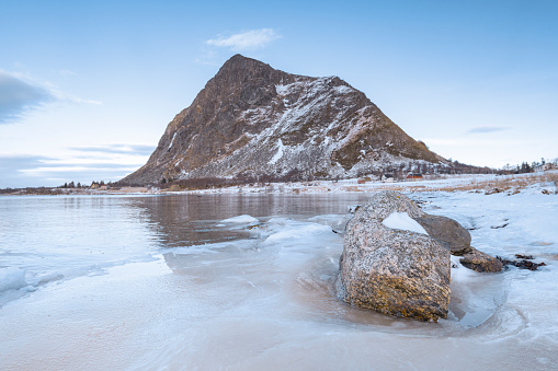 Hoven mountain at Gimsøya island in the Lofoten during winter in Northern Norway.