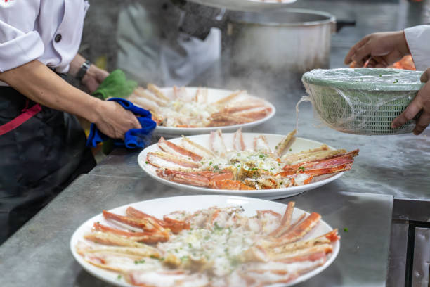 istock The chef's hand is adding seasoning to the cooked king crab 1926892802
