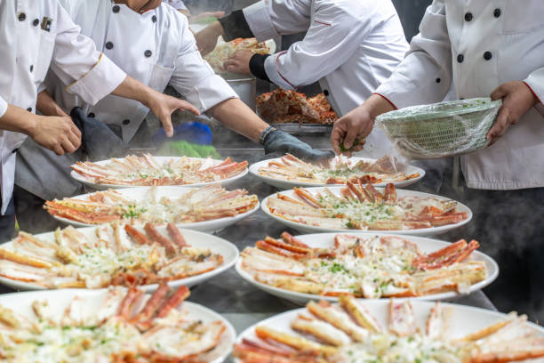istock The chef is adding seasoning to the cooked king crab on the plate 1926896965