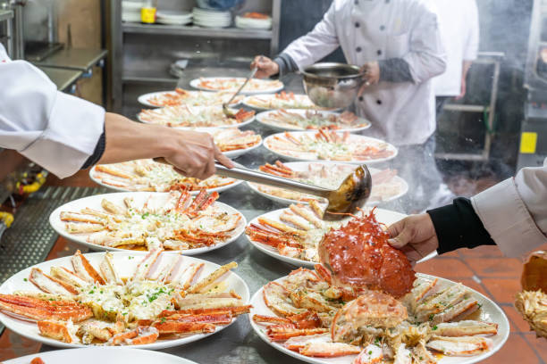 istock The chef's hand is adding seasoning to the cooked king crab 1926900122