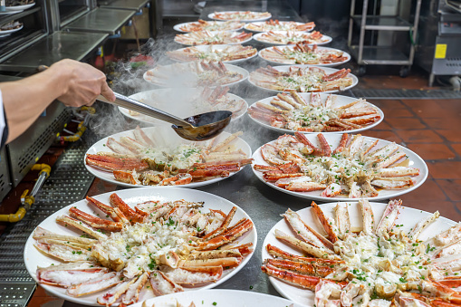 Close-up of unrecognizable woman seafood buffet