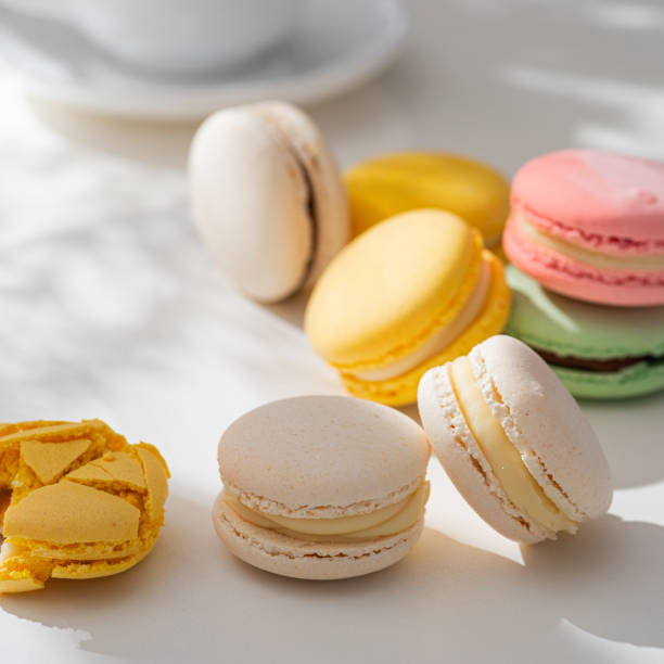 istock Sweet and colourful french macaroons or macaron on a light background. 1926904486