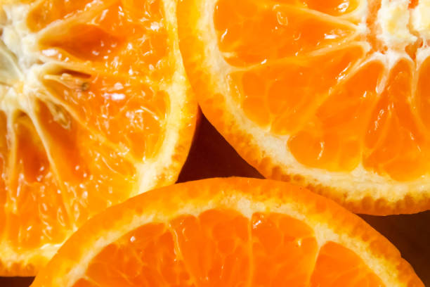 istock close up of orange fruit slices 1926938623