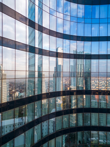 Istanbul's glass and concrete skyscrapers, home to offices, hotels, and residential complexes. Aerial drone view.