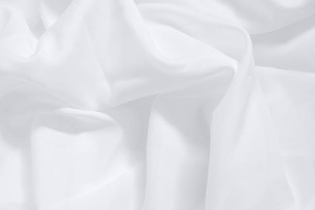 istock Soft focus white smooth ripple linen fabric on detail texture background 1926975594