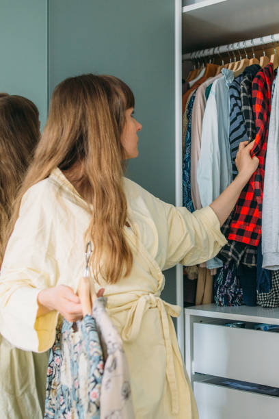 istock Woman choosing her outfit 1926989924