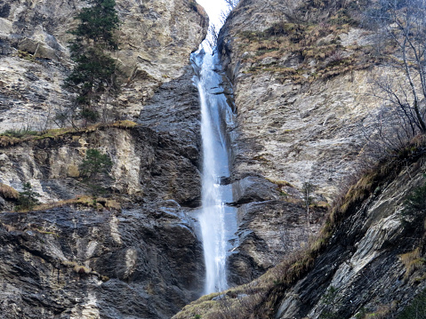 Waterfalls in the wild alpine canyon of Helltobel above in the Calfeisental valley and in the UNESCO World Heritage Tectonic Arena Sardona (UNESCO-Welterbe Tektonikarena Sardona), Vättis - Switzerland / Schweiz