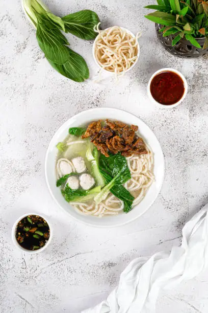 Photo of Fish Ball Rice Noodles Soup with Beef Flank Traditional Chinese Cuisine Food