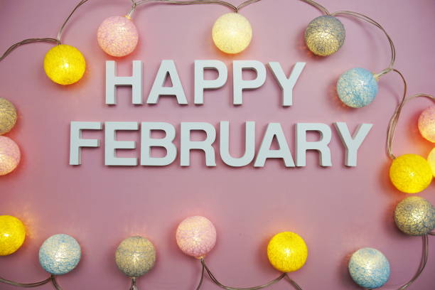 istock Happy February alphabet letters on pink background 1927035475