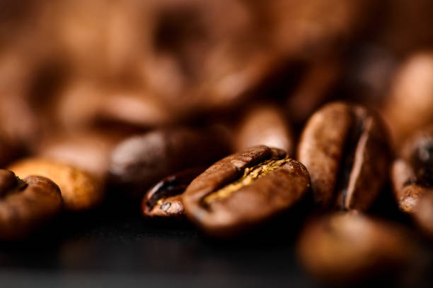 Close up of roasted coffee beans background.