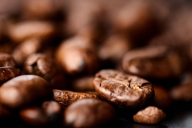 istock Close up of coffee beans background 1927059276