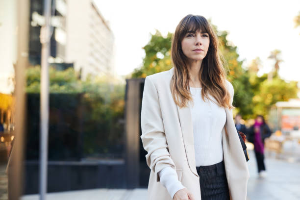 Confident Stride: Businesswoman Takes a Step with Self-Assuredness