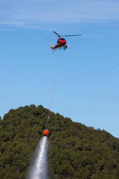 istock small planes and helicopters carrying out practices with swamp water 1927074140