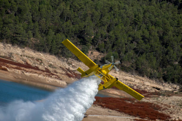 istock small planes and helicopters carrying out practices with swamp water 1927074677