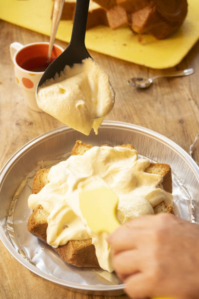 istock preparation of a cream-filled dessert 1927081128