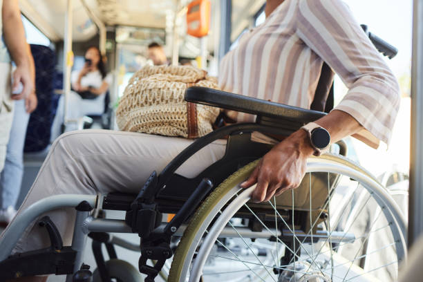 istock Unrecognizable disabled woman entering in a public transportation. 1927081133