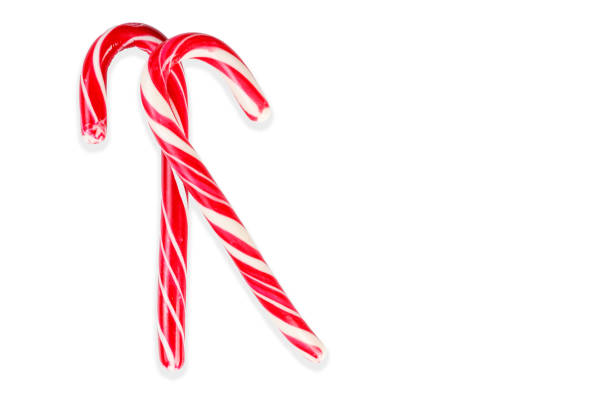 istock New Year's sticks candy canes with stripes on a white isolated background 1927085344