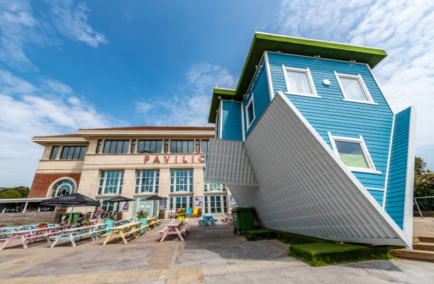 Bournemouth, UK. 22 May 2023. Bournemouth Pavilion and upside down house