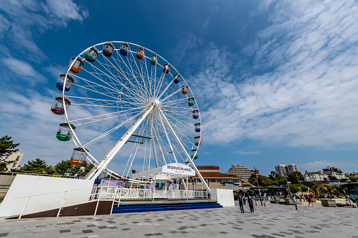 Bournemouth, UK. 22 May 2023. People in front of Bournemouth Big Wheel on the seafront.