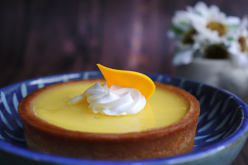 Lemon Tart or lime key pie. A perfect blend of sweet and tangy taste. A buttery, golden crust embraces a luscious lemon filling, promising a burst of citrusy bliss.