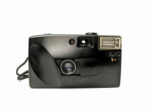 istock An old analog camera, using film tape, isolated on a white background 1927117596