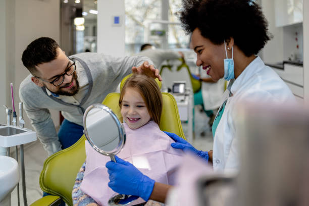 istock Father-daughter dental visit 1927139278