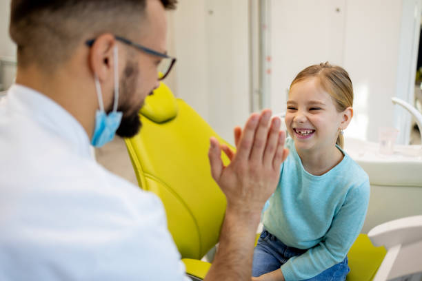 istock Friendly pediatric dental care 1927144137