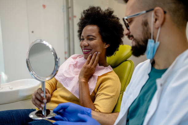 istock Expert dentist providing comprehensive care 1927146233