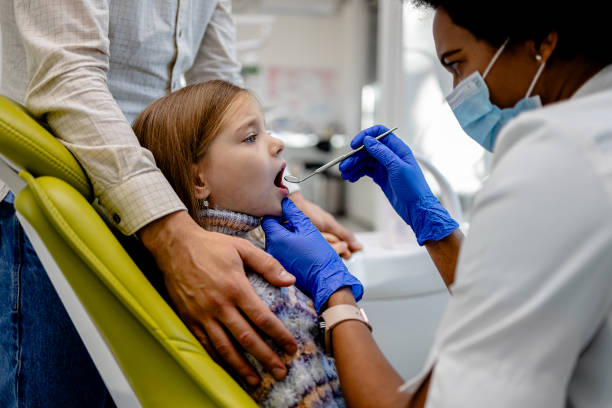 istock Dental visit emphasizing family involvement 1927146747