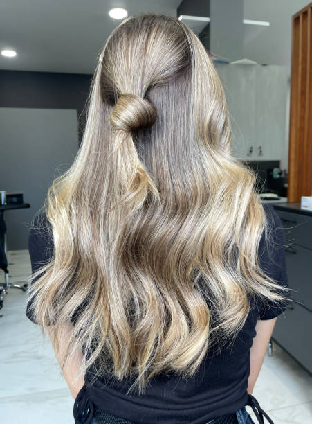 istock Long curly hair dyeing in air touch or shatush technique. 1927158853