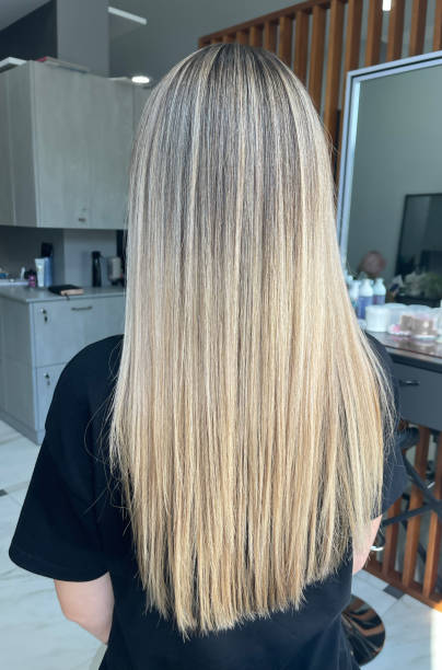 istock Long hair dyeing in air touch or shatush technique. Look from behind 1927167376