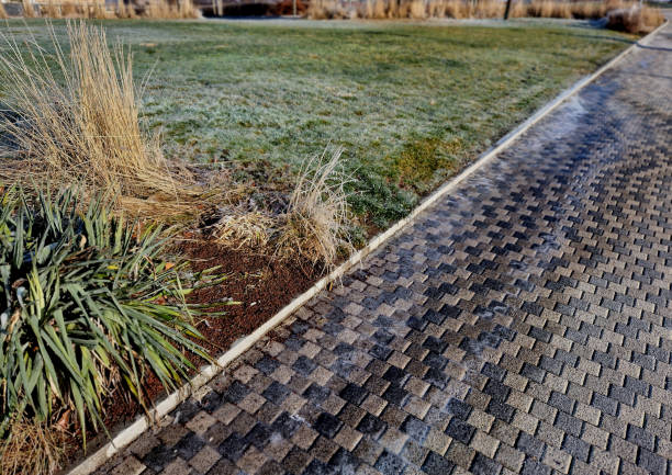 istock if the irrigation system is started in the winter and ice forms on the sidewalk and lawn in the frost. frost damage to hoses and sprinklers. risk of injury to pedestrians on frozen puddles 1927192773
