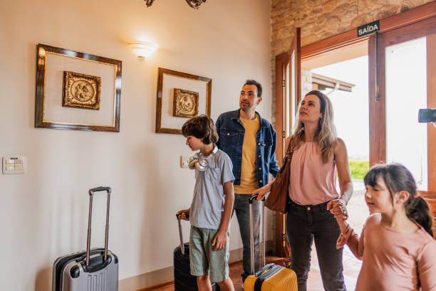 istock Family entering a hotel 1927195453