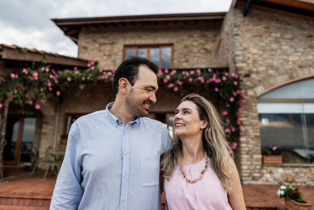 istock Mature couple looking at each other at home 1927214830