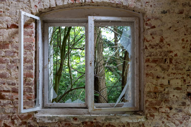 istock old wooden window in an abandoned house 1927230951