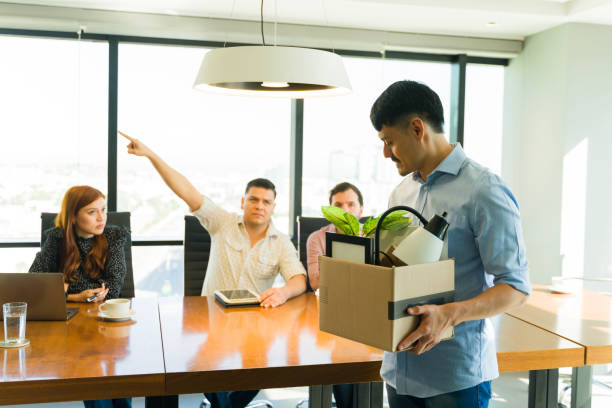 istock Latin man getting fired from his job and leaving 1927272443