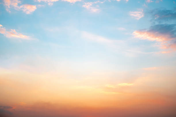 istock Beautiful , luxury soft gradient orange gold clouds and sunlight on the blue sky perfect for the background, take in everning,Twilight, Large size, high definition landscape photo 1927307288