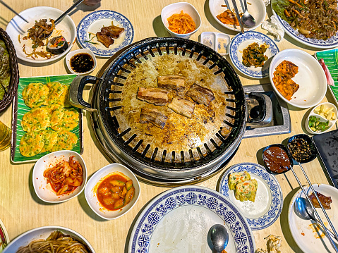 Closeup view of Korean food grill meant on table.