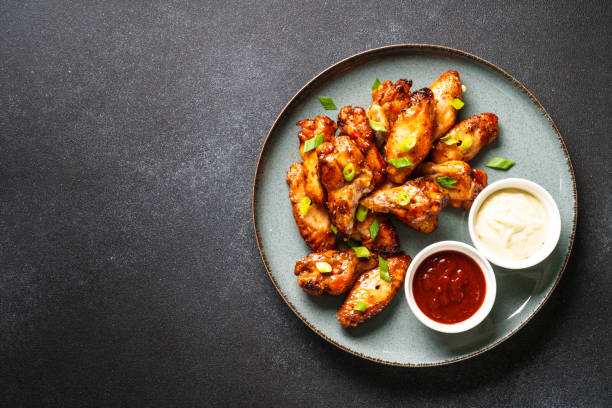 istock Chicken wings in bbq sauce grilled . 1927360697