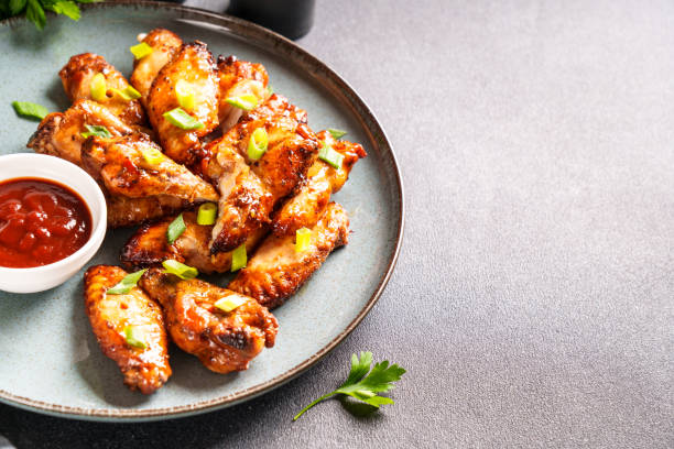 istock Chicken wings in bbq sauce grilled . 1927361775