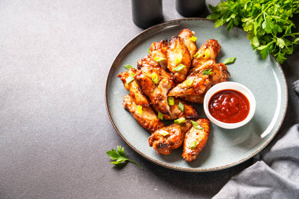 istock Chicken wings in bbq sauce grilled . 1927361777