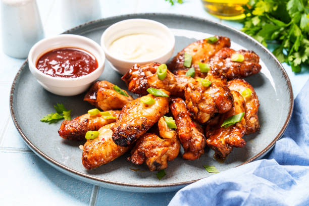 istock Chicken wings in bbq sauce grilled . 1927362842
